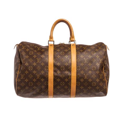 louis vuitton duffle used|More.